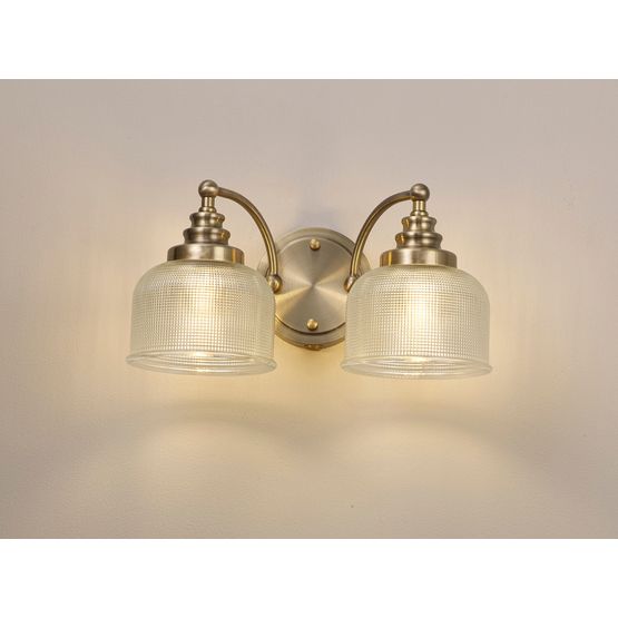 Shelby Switched 2 Light E27 Antique Brass / Prismatic Glass Wall Lamp